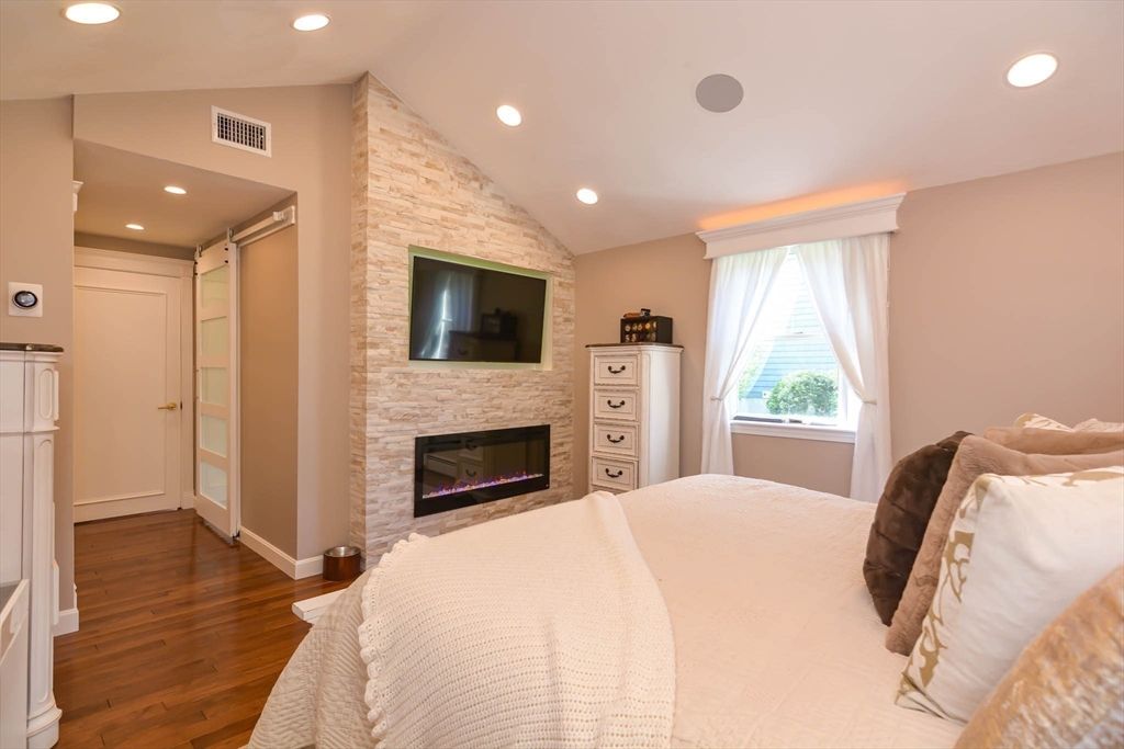 Bedroom, Fireplace, Interior, Recessed Lighting, Wood Texture Flooring