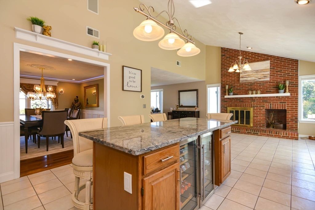 Chandelier, Dining room, Fireplace, Interior, Pendant Lights, Recessed Lighting, Stone Walls