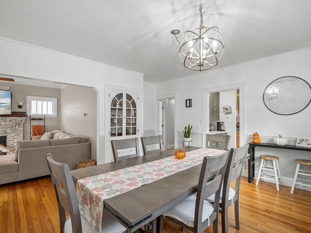 Chandelier, Dining room, Fireplace, Interior, Living room, Pendant Lights, Wood Texture Flooring