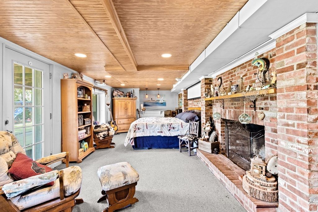 Bedroom, Fireplace, Interior, Pendant Lights, Recessed Lighting, Stone Walls, Wooden Ceilings