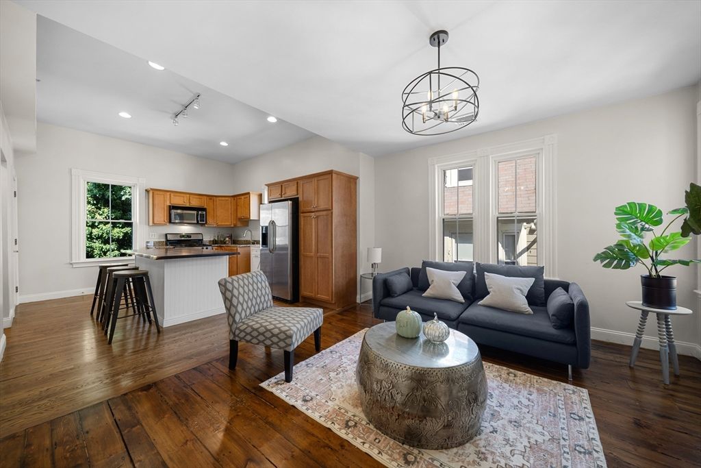 Chandelier, Interior, Kitchen, Living room, Pendant Lights, Recessed Lighting, Stainless Steel Appliances, Wood Texture Flooring