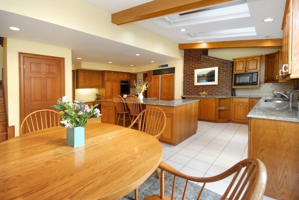 Dining room, Fireplace, Interior, Kitchen, Recessed Lighting, Stone Walls, Wooden Beams