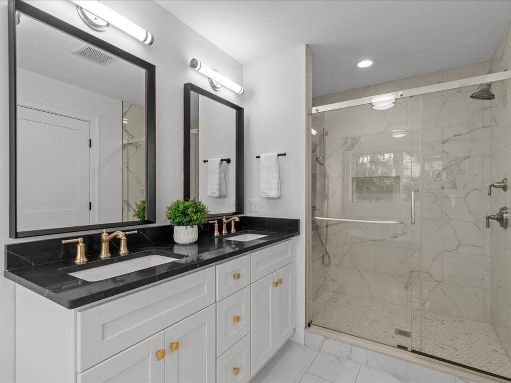 Bathroom, Dual Sink Vanities, Glass Shower, Interior, Marble, Marble Walls, Recessed Lighting