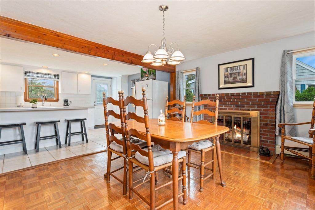 Chandelier, Dining room, Fireplace, Interior, Kitchen, Recessed Lighting, Stone Walls, Wood Texture Flooring