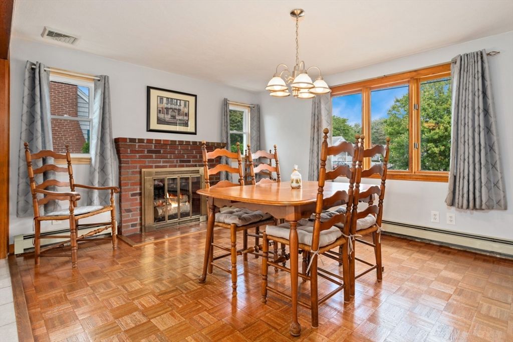 Dining room, Fireplace, Interior, Pendant Lights, Wood Texture Flooring