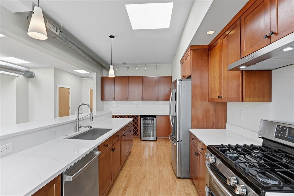 Interior, Kitchen, Pendant Lights, Recessed Lighting, Stainless Steel Appliances, Wood Texture Flooring
