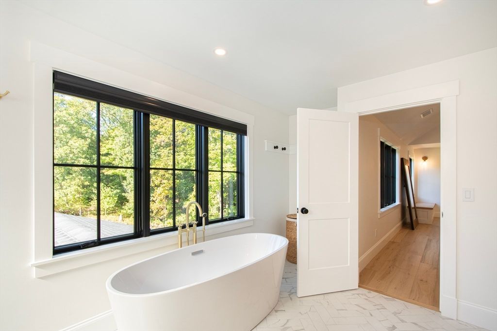 Bathroom, Free Standing Baths, Interior, Marble, Recessed Lighting, Wood Texture Flooring