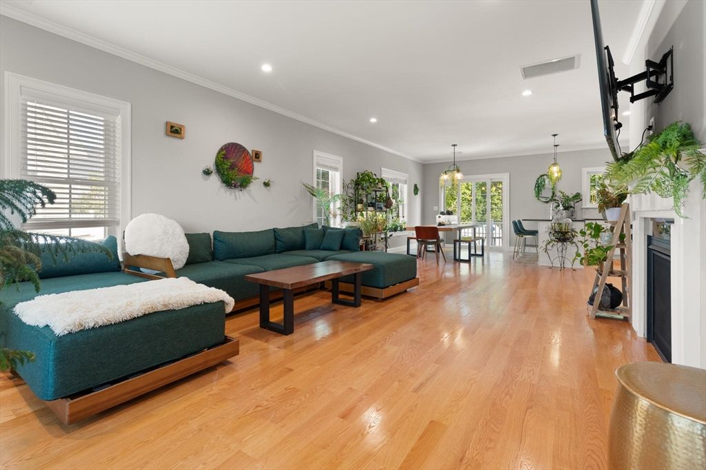 Dining room, Fireplace, Interior, Living room, Pendant Lights, Recessed Lighting, Wood Texture Flooring