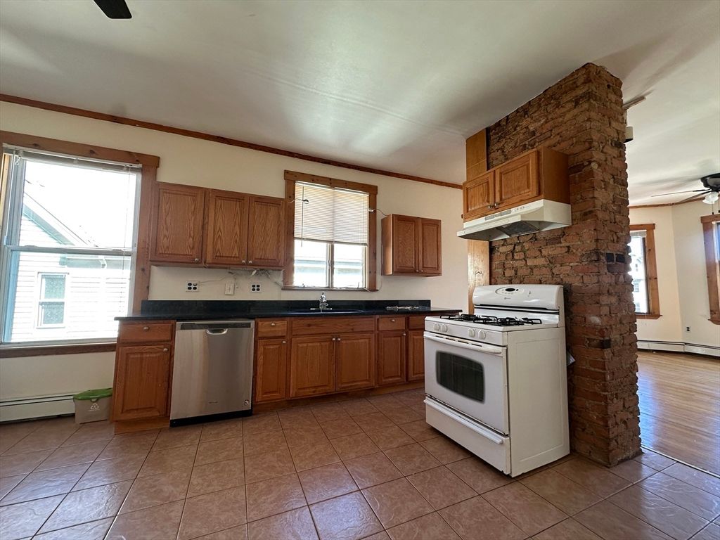 Interior, Kitchen, Stainless Steel Appliances, Stone Walls, Wood Texture Flooring