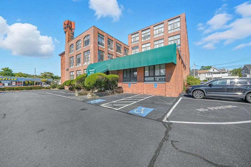 Exterior, Facade, Brick Facade, Condo Building