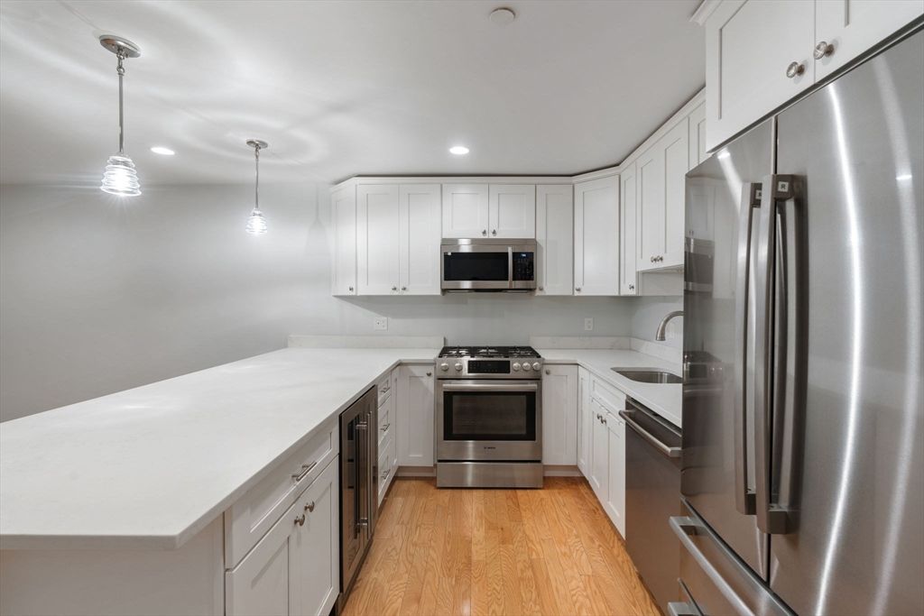 Interior, Kitchen, Pendant Lights, Recessed Lighting, Stainless Steel Appliances, Wood Texture Flooring