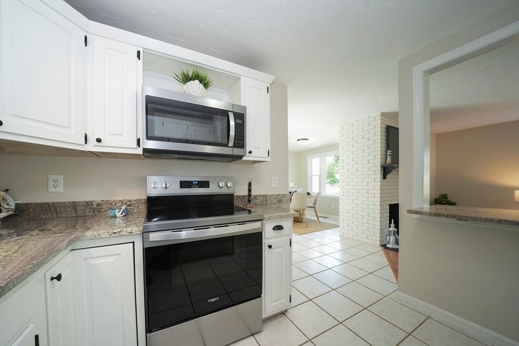 Dining room, Fireplace, Interior, Kitchen, Stainless Steel Appliances