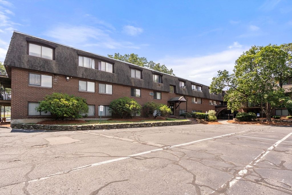 Exterior, Facade, Brick Facade, Condo Building
