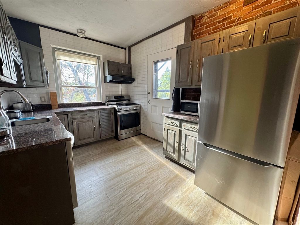 Interior, Kitchen, Stainless Steel Appliances, Stone Walls, Wood Texture Flooring