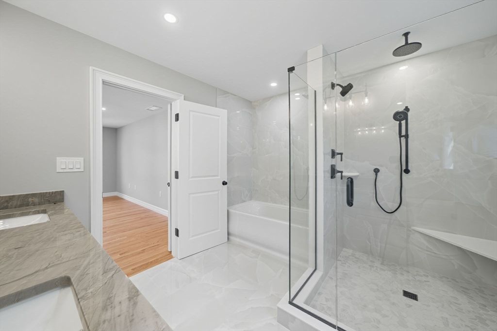 Bathroom, Glass Shower, Interior, Marble, Marble Walls, Recessed Lighting, Wood Texture Flooring