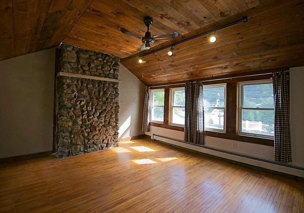 Empty room, Fireplace, Interior, Stone Walls, Wooden Ceilings, Wood Texture Flooring