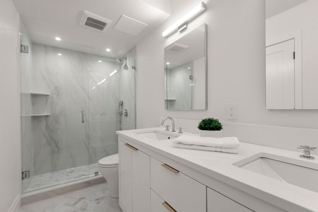 Bathroom, Dual Sink Vanities, Glass Shower, Interior, Marble, Marble Walls, Recessed Lighting