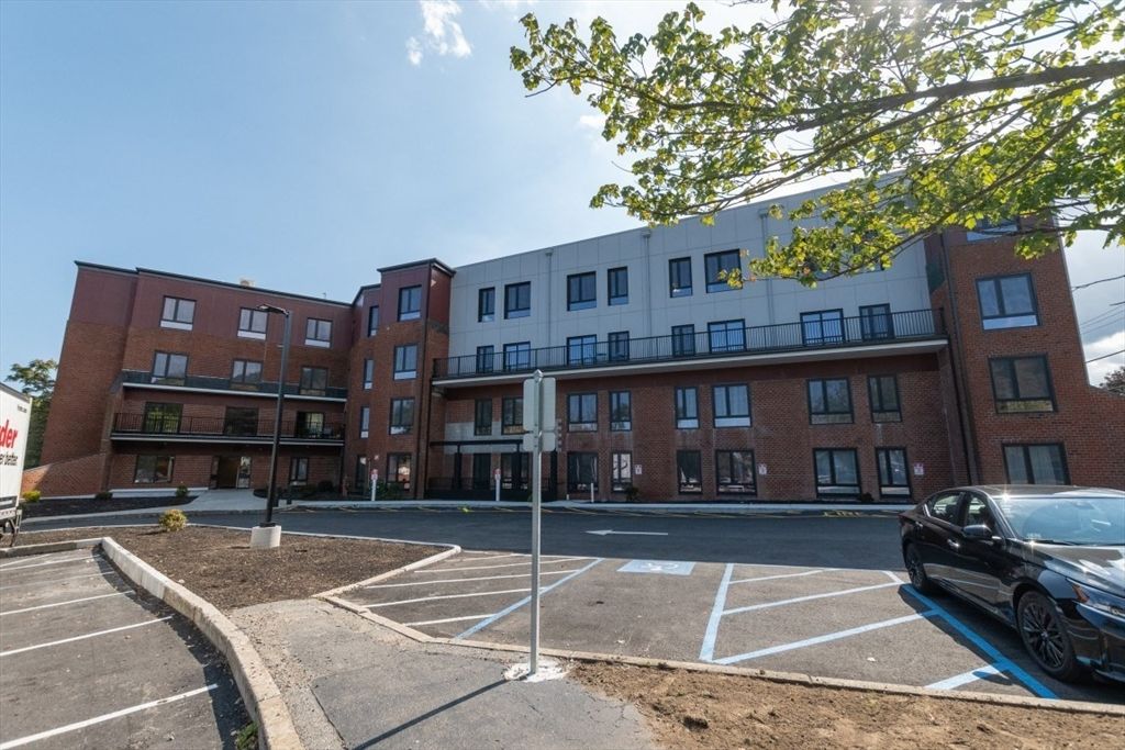 Exterior, Facade, Brick Facade, Condo Building