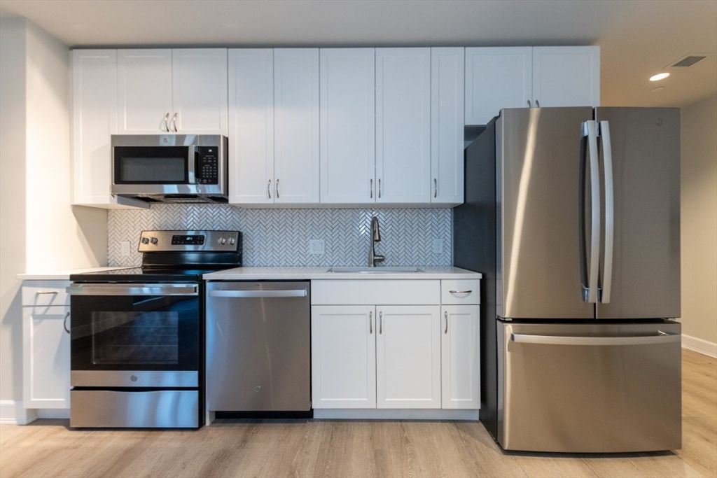 Interior, Kitchen, Recessed Lighting, Stainless Steel Appliances, Wood Texture Flooring