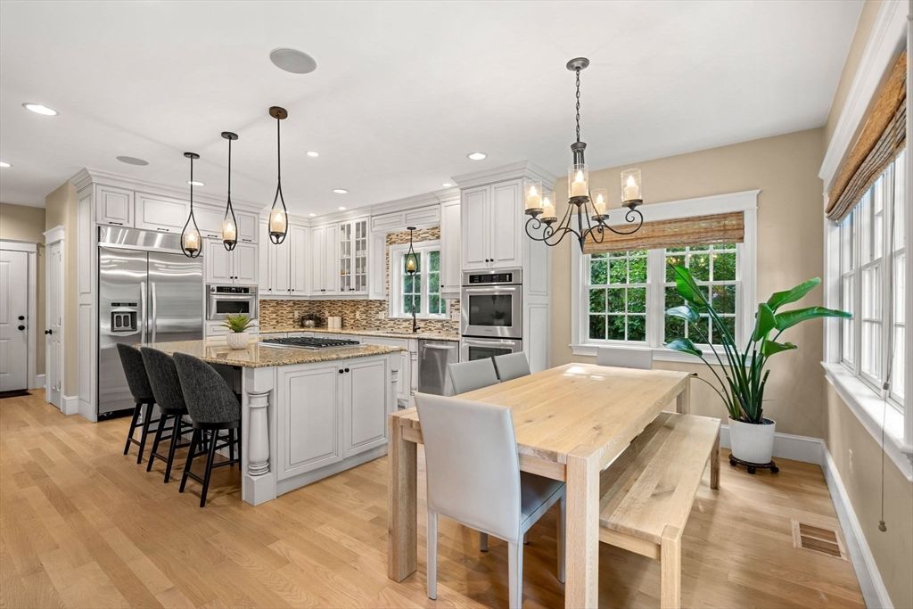 Chandelier, Dining room, Interior, Kitchen, Pendant Lights, Recessed Lighting, Stainless Steel Appliances, Wood Texture Flooring