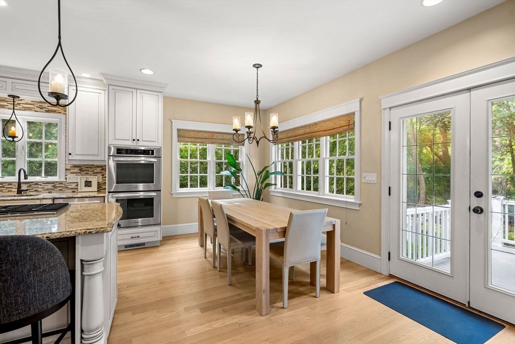 Chandelier, Dining room, Interior, Kitchen, Pendant Lights, Recessed Lighting, Stainless Steel Appliances, Wood Texture Flooring