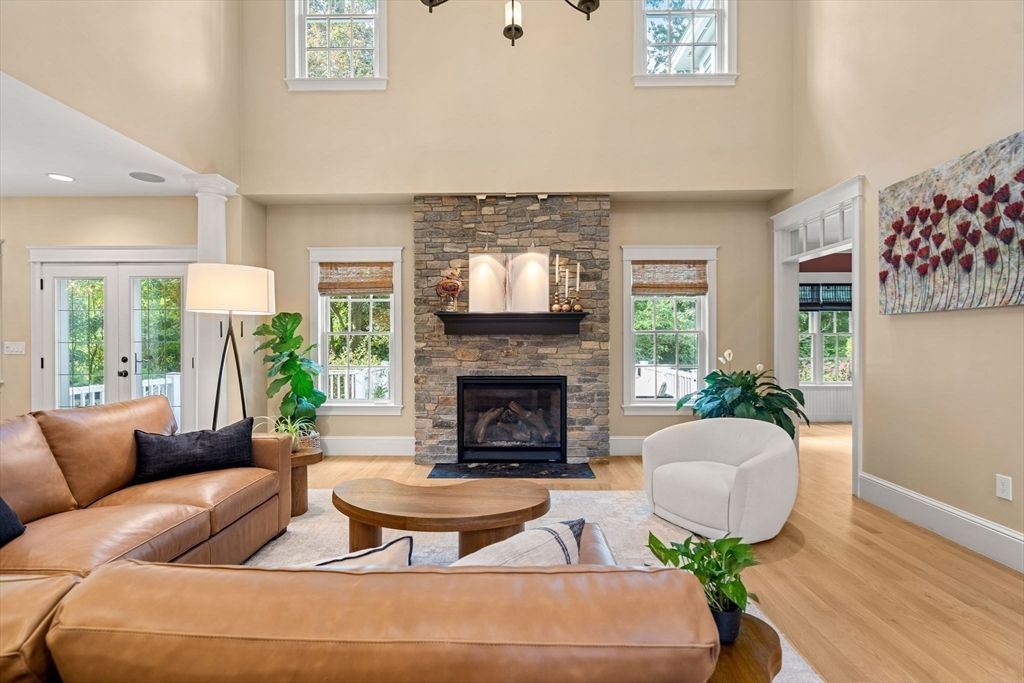 Fireplace, Interior, Living room, Recessed Lighting, Stone Walls, Wood Texture Flooring
