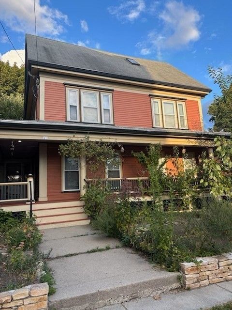 Exterior, Facade, Solar Panels, American Foursquare