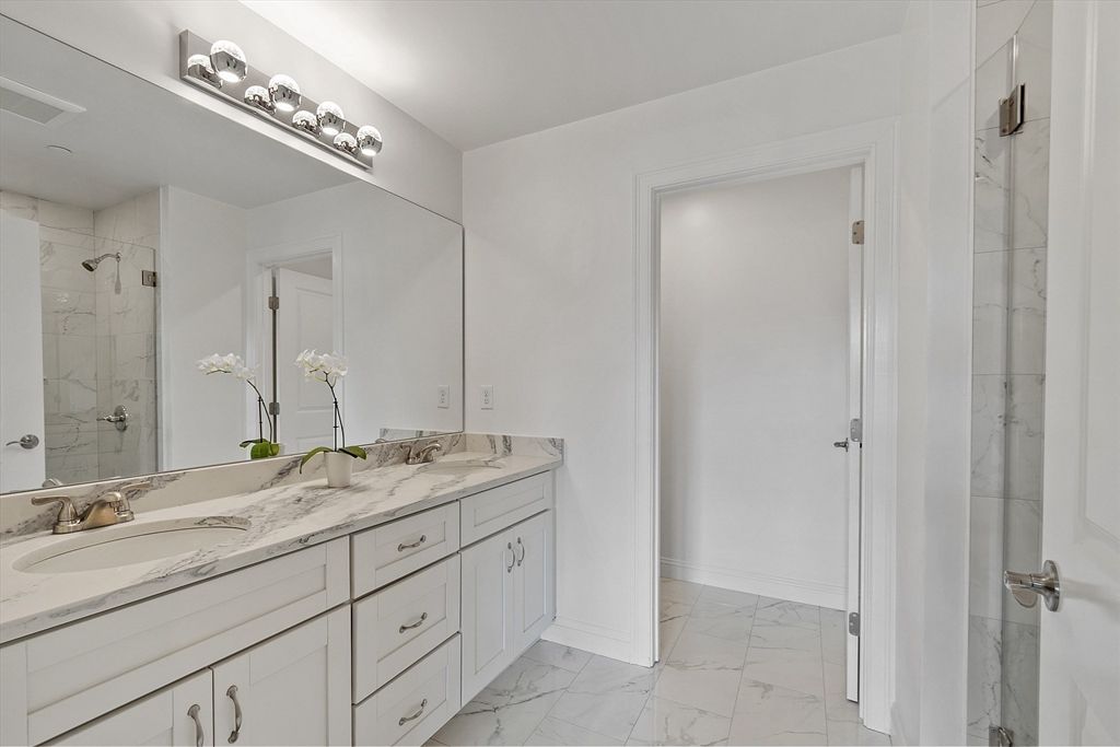 Bathroom, Dual Sink Vanities, Glass Shower, Interior, Marble, Marble Walls