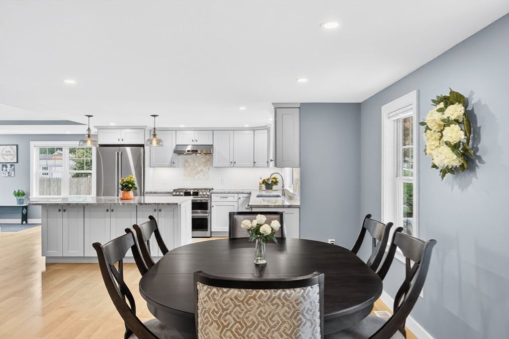 Dining room, Interior, Kitchen, Pendant Lights, Recessed Lighting, Stainless Steel Appliances, Wood Texture Flooring