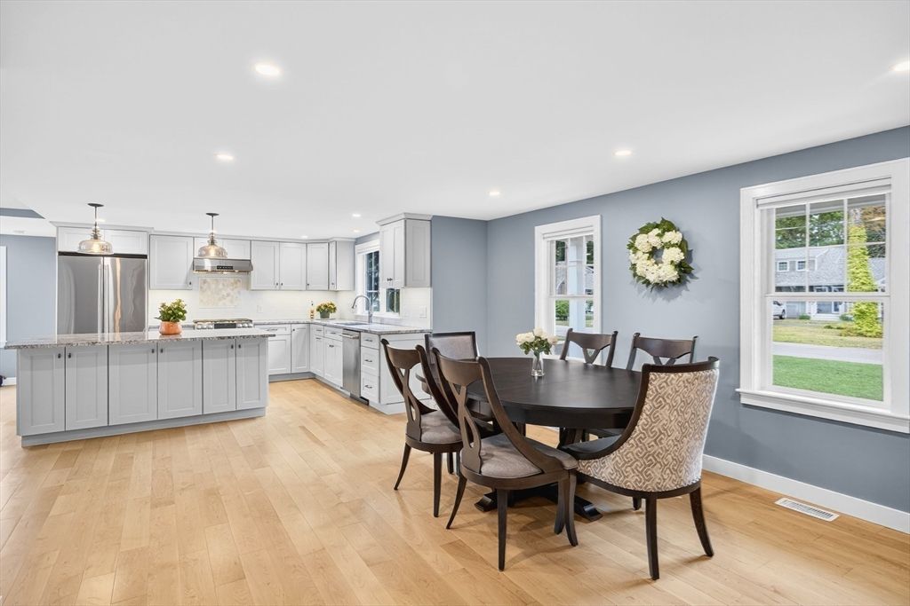 Dining room, Interior, Kitchen, Pendant Lights, Recessed Lighting, Stainless Steel Appliances, Wood Texture Flooring