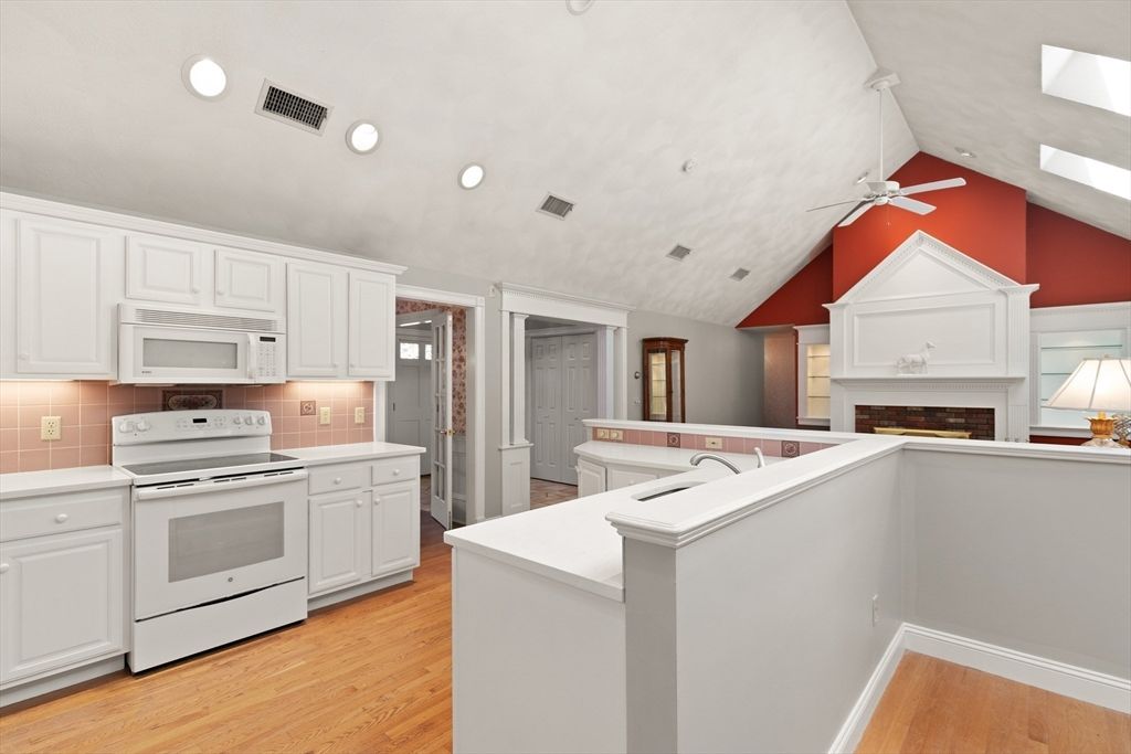 Fireplace, Interior, Kitchen, Recessed Lighting, Wood Texture Flooring