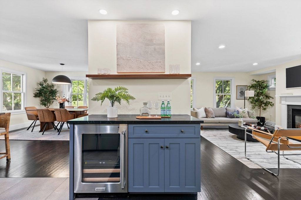 Dining room, Fireplace, Interior, Kitchen, Living room, Pendant Lights, Recessed Lighting, Stainless Steel Appliances, Wood Texture Flooring