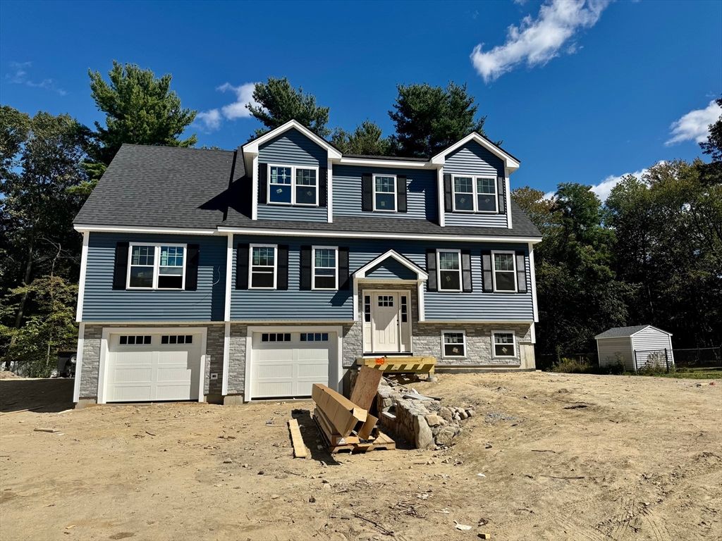 Attached, Exterior, Facade, Raised Ranch