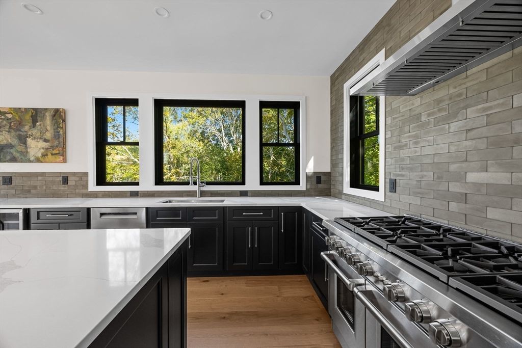 Interior, Kitchen, Recessed Lighting, Stainless Steel Appliances, Stone Walls, Wood Texture Flooring