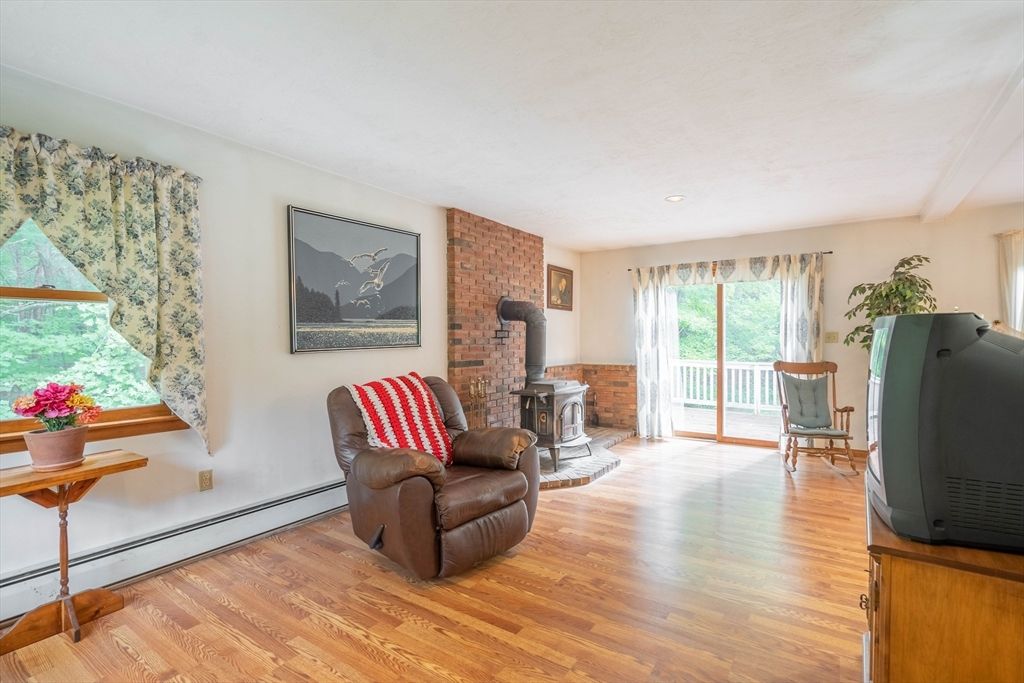 Fireplace, Interior, Recessed Lighting, Stone Walls, Wood Texture Flooring