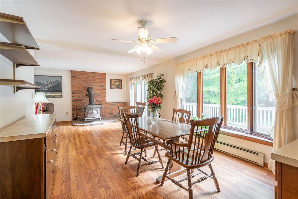 Dining room, Fireplace, Interior, Stone Walls, Wood Texture Flooring