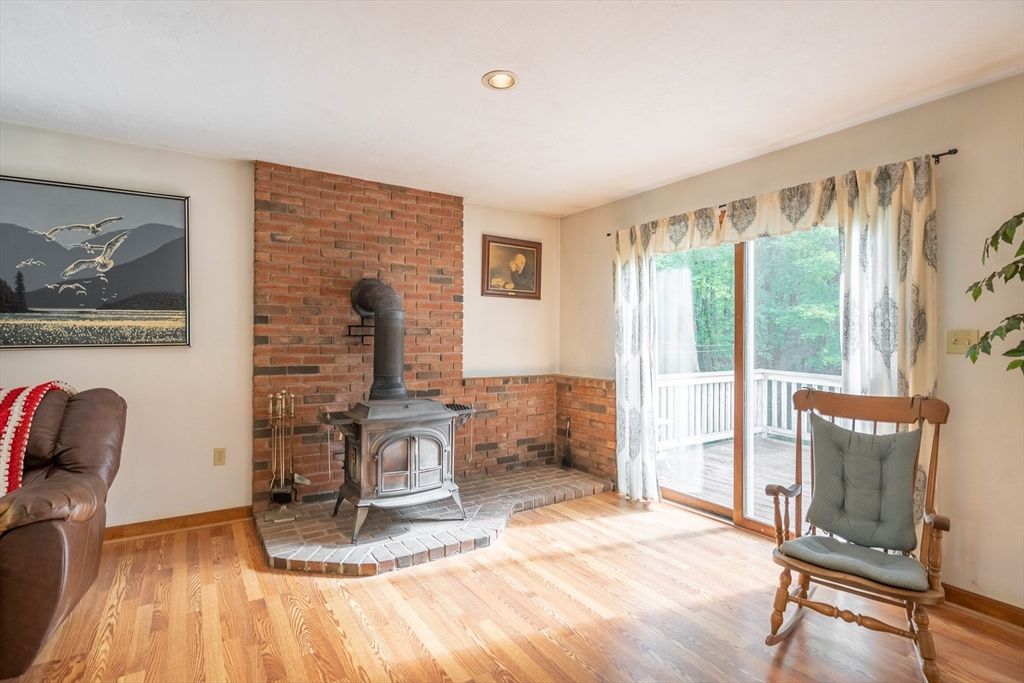 Fireplace, Interior, Recessed Lighting, Stone Walls, Wood Texture Flooring