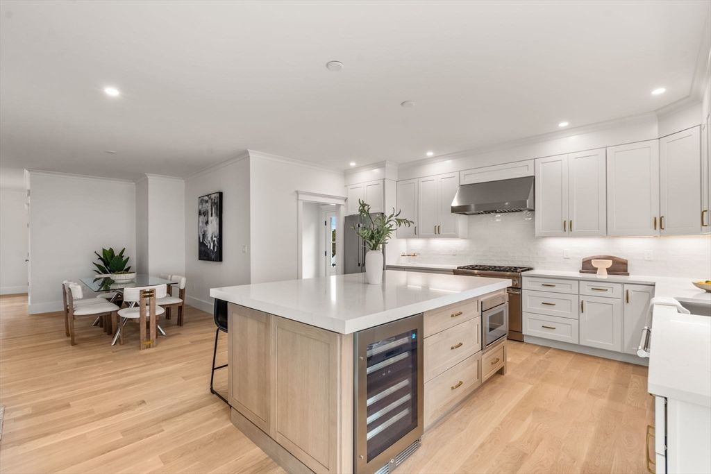 Dining room, Interior, Kitchen, Recessed Lighting, Stainless Steel Appliances, Wood Texture Flooring