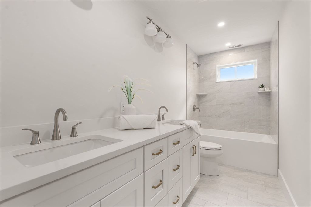 Bathroom, Dual Sink Vanities, Interior, Marble, Marble Walls, Recessed Lighting