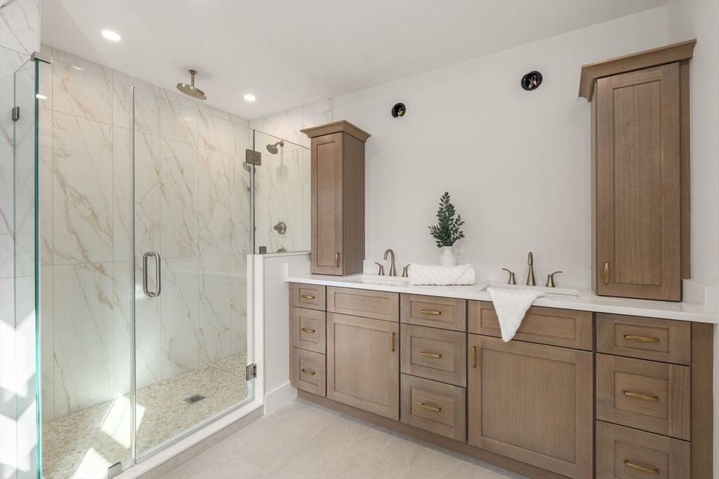 Bathroom, Dual Sink Vanities, Glass Shower, Interior, Marble Walls, Recessed Lighting