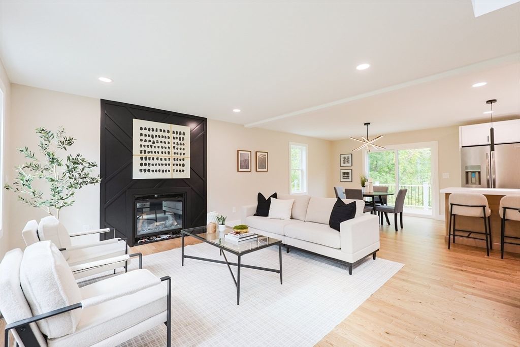 Dining room, Fireplace, Interior, Living room, Pendant Lights, Recessed Lighting, Wood Texture Flooring