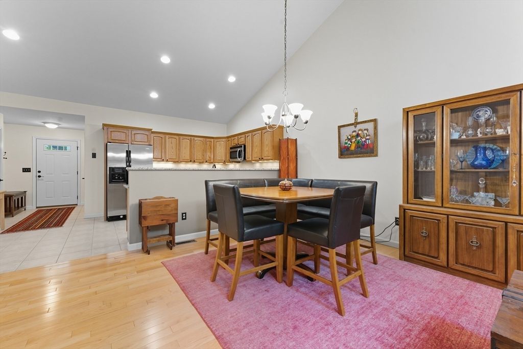 Chandelier, Dining room, Interior, Kitchen, Recessed Lighting, Stainless Steel Appliances, Wood Texture Flooring