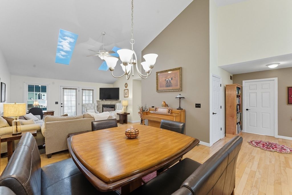 Chandelier, Dining room, Fireplace, Interior, Living room, Wood Texture Flooring