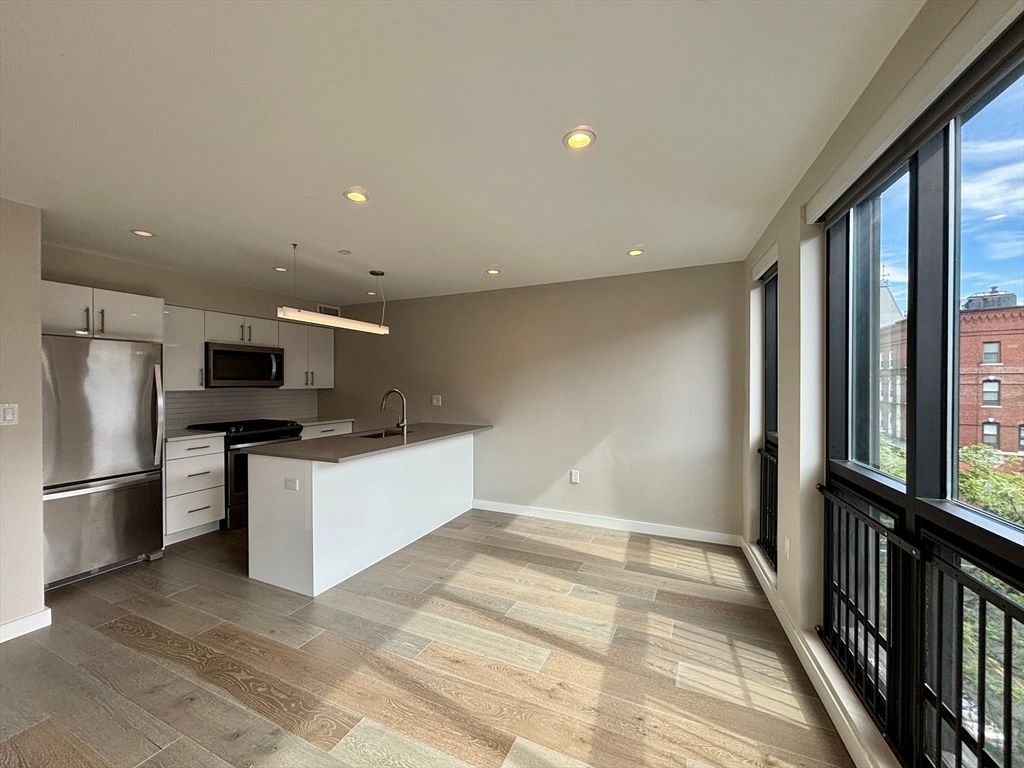 Interior, Kitchen, Pendant Lights, Recessed Lighting, Stainless Steel Appliances, Wood Texture Flooring