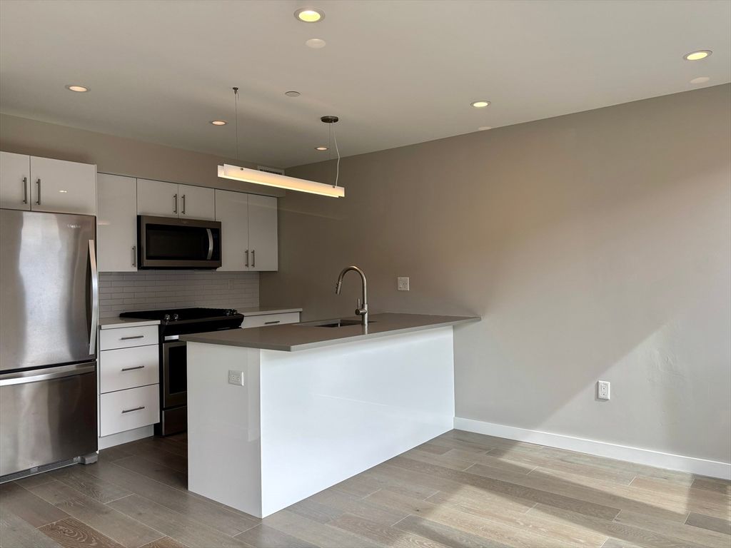 Interior, Kitchen, Pendant Lights, Recessed Lighting, Stainless Steel Appliances, Wood Texture Flooring