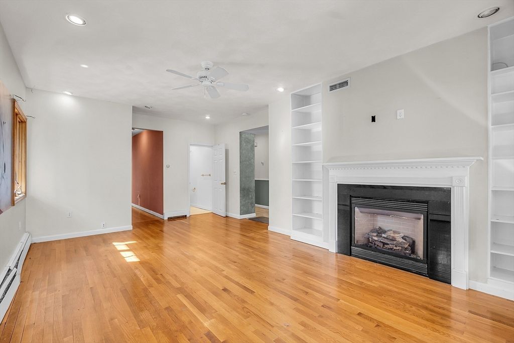 Empty room, Fireplace, Interior, Recessed Lighting, Wood Texture Flooring