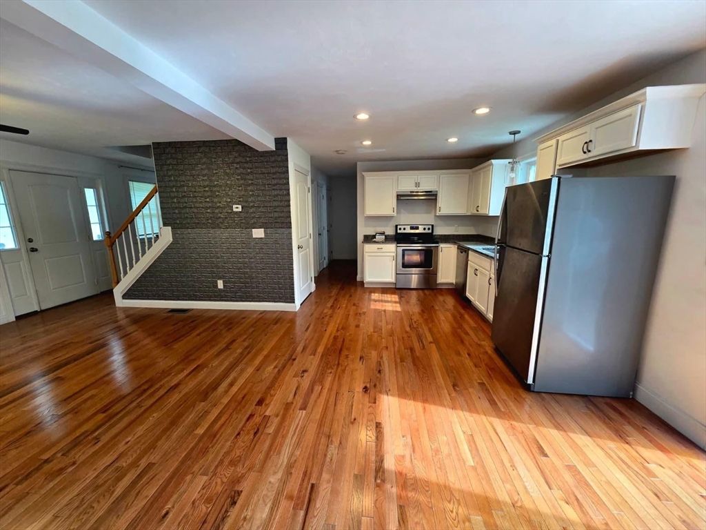 Interior, Kitchen, Recessed Lighting, Stainless Steel Appliances, Stone Walls, Wood Texture Flooring