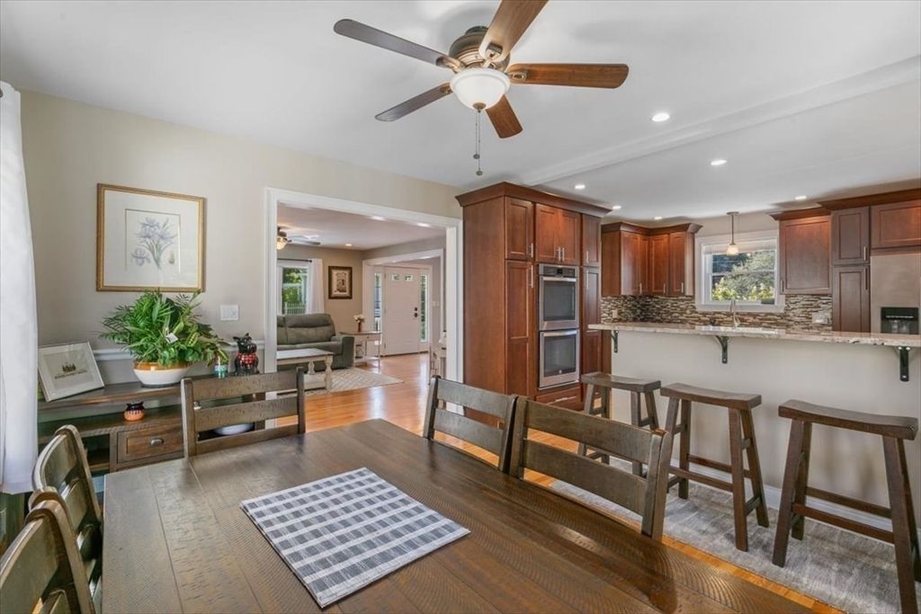 Dining room, Interior, Kitchen, Living room, Recessed Lighting, Stainless Steel Appliances, Wood Texture Flooring