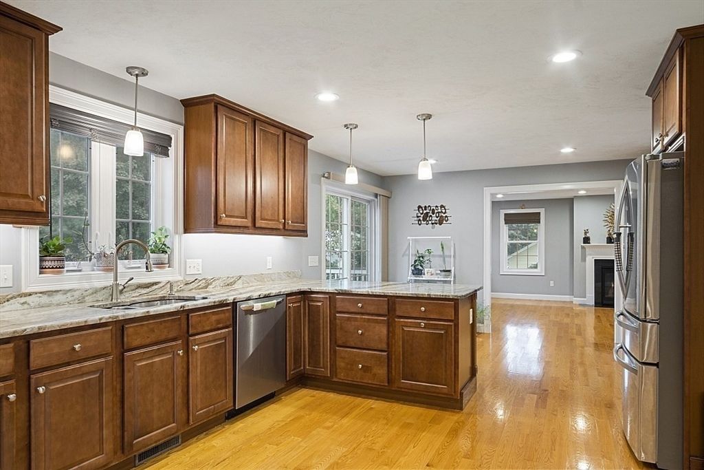 Fireplace, Interior, Kitchen, Pendant Lights, Recessed Lighting, Tile Countertops, Wood Texture Flooring