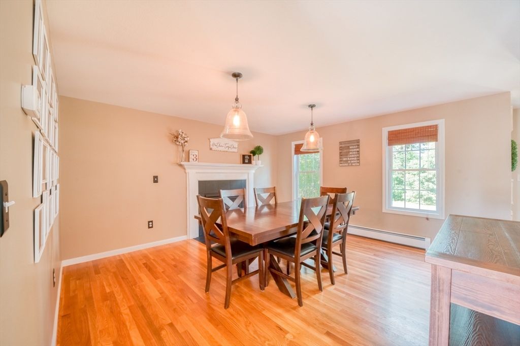 Dining room, Fireplace, Interior, Pendant Lights, Wood Texture Flooring